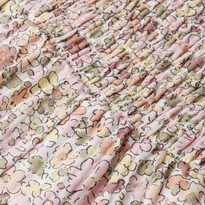 Makemake Organics Organic Smocked Jumpsuit - Pastel Bloom