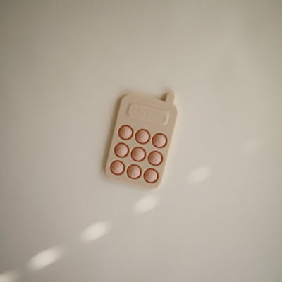 Mushie Phone Press Toy – Sensory Pop Toy for Babies