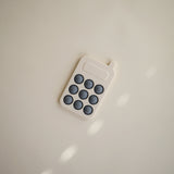 Mushie Phone Press Toy – Sensory Pop Toy for Babies