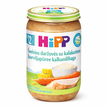Jar of Hipp baby food with colorful lid on a white background