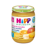 Jar of Hipp baby food with fruits and cereals on a white background