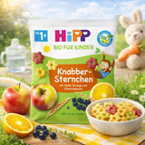 Hipp organic children's snack package with fruits and a bowl of cereal on a nature-themed background