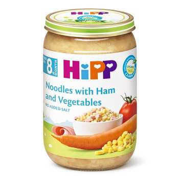 Jar of HiPP baby food with noodles, ham, and vegetables on a white background