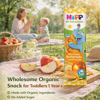 Hipp organic snack package with a picnic scene in the background