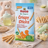 Holle Bio Organic Crispy Sticks packaging with baby items in the background