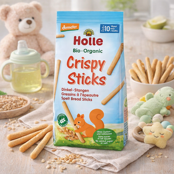 Holle Bio Organic Crispy Sticks packaging with baby items in the background