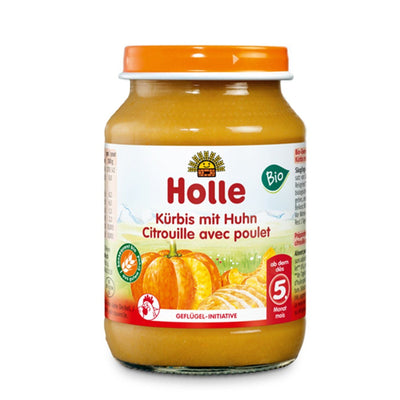 Jar of Holle baby food with pumpkin and chicken on a white background