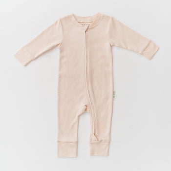 Kit & Petal Long Sleeve Romper in Rosy Peach