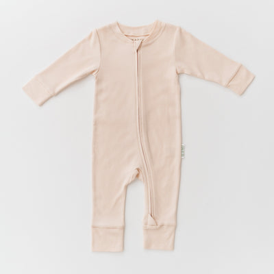 Kit & Petal Long Sleeve Romper in Rosy Peach