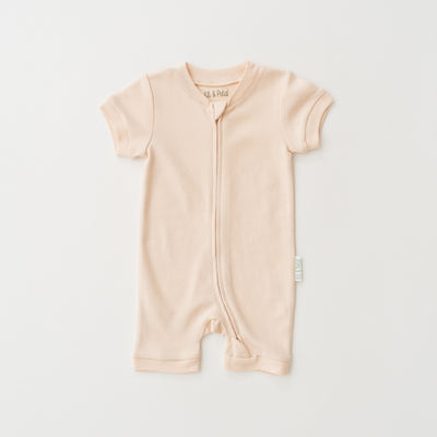 Kit & Petal Short Sleeve Romper in Rosy Peach