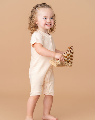 Kit & Petal Short Sleeve Romper in Rosy Peach