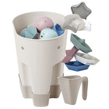 Shnuggle Bath Accessories Bundle 4-piece set displayed beside a baby bathtub
