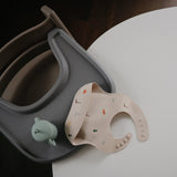 Mushie Silicone Baby Bib – Adjustable Catch-All Bib