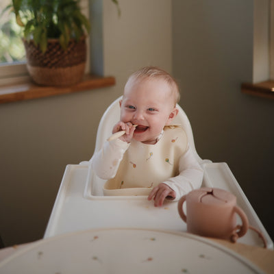 Mushie Silicone Baby Bib – Adjustable Catch-All Bib