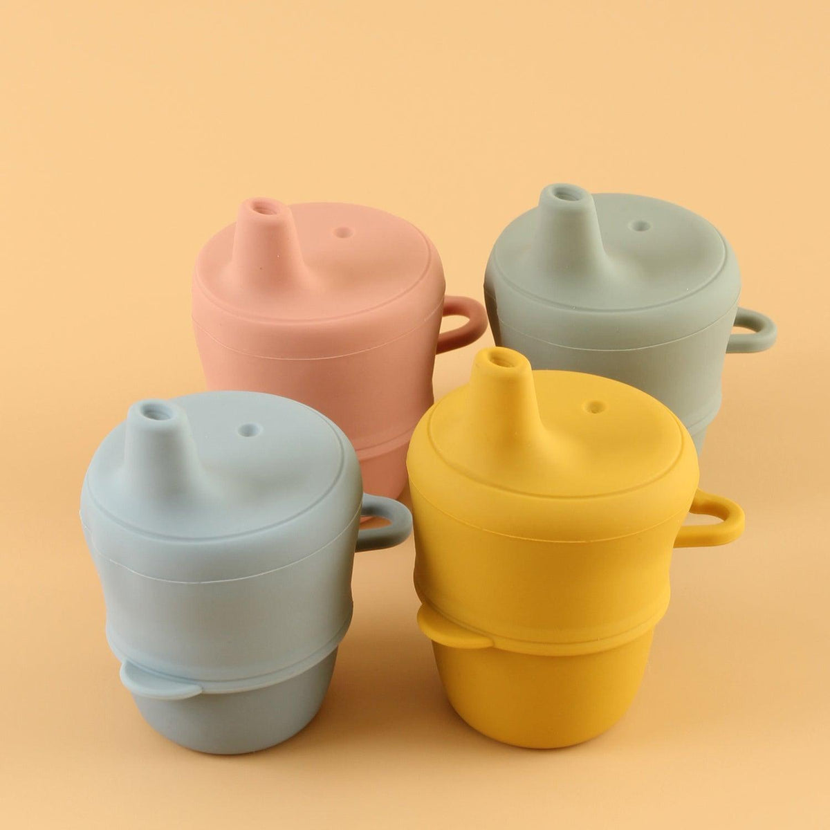 https://euromallusa.com/cdn/shop/products/silicone-cup-with-sippy-lid-ether-euromallusa-3_1200x.jpg?v=1695323479